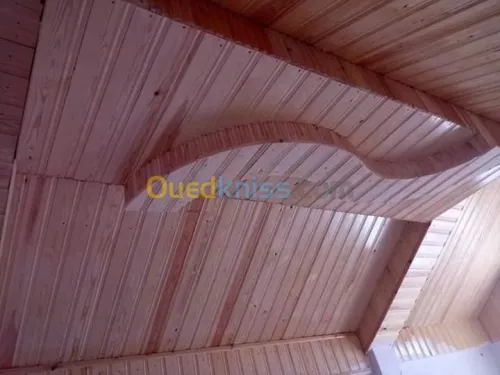 Charpente en bois, tuile et F.P PVC