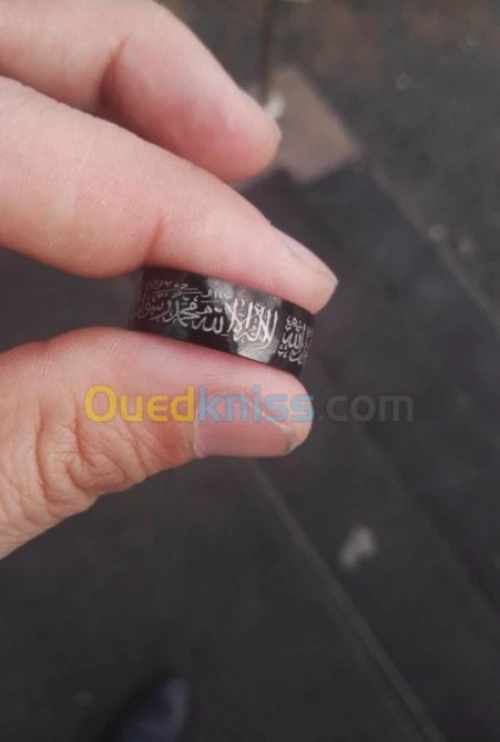 خاتم تيتانيوم بكتابة الشهادة 