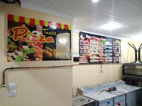 Habillage vitrine et panneaux (pub) 