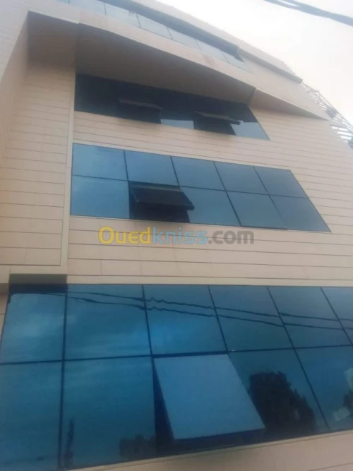 Mur rideau,aluco band,terre cuite.