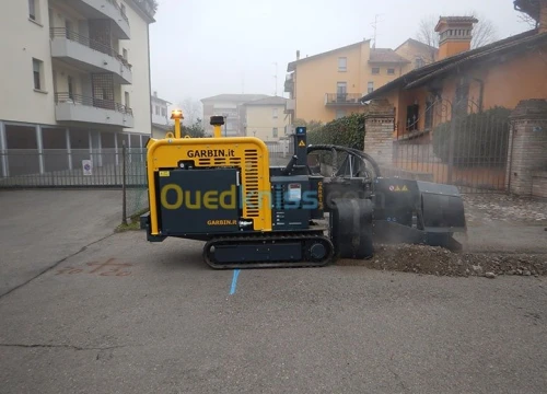 Location trancheuse CAT et GARBIN