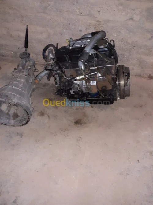 محرك نيسان Qd32