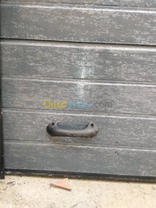 Fabrication et pose Porte Sectionnelle