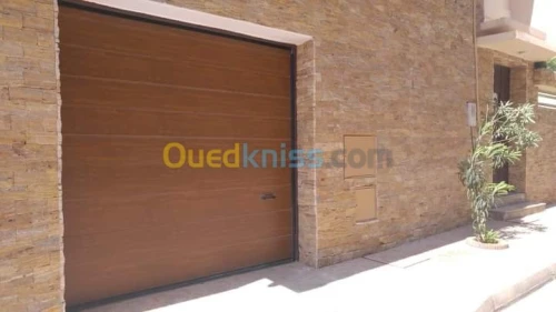 Fabrication et pose Porte Sectionnelle