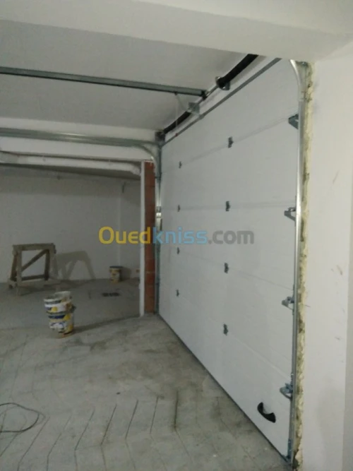 Fabrication et pose Porte Sectionnelle
