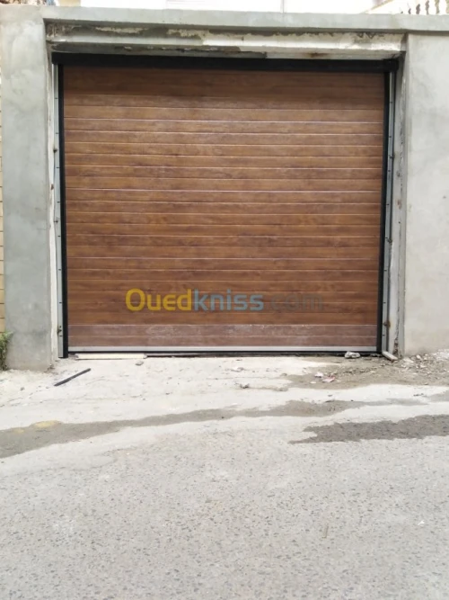 Fabrication et pose Porte Sectionnelle