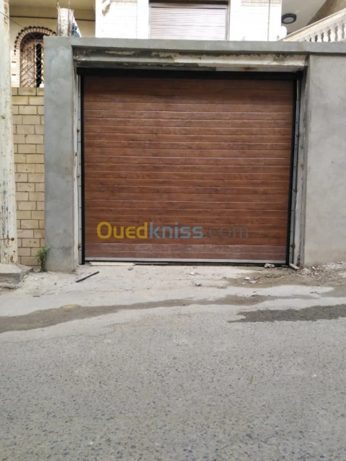 Fabrication et pose Porte Sectionnelle