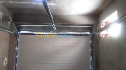 Fabrication et pose Porte Sectionnelle