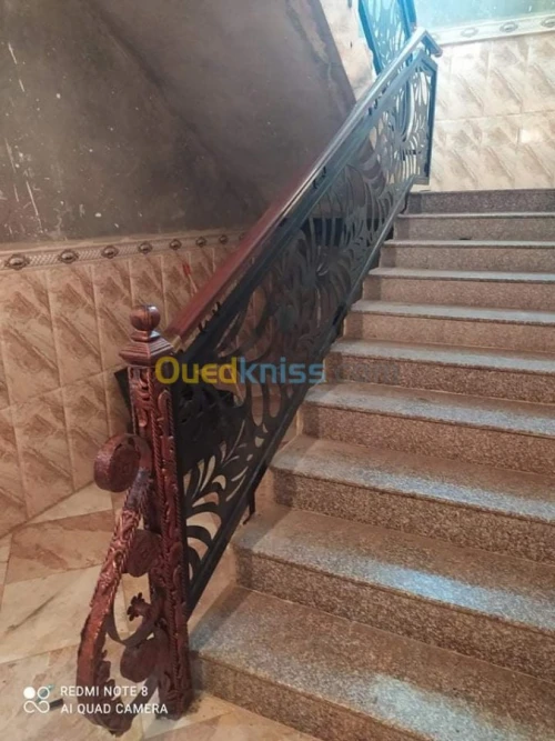Fabrication/pose de rampe d'escalier
