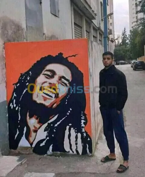 Dessinateur sur les mures رسم على الجد
