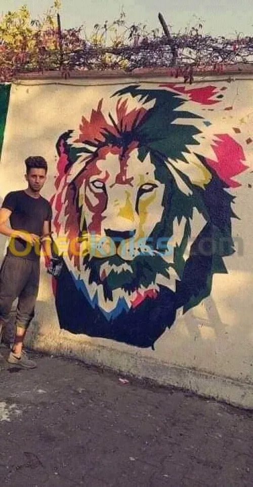 Dessinateur sur les mures رسم على الجد