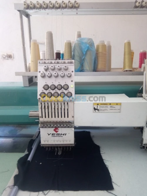  Machine a brodrie á deux têtes