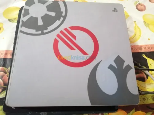 PlayStation slim 1 tera avec 2 mannete