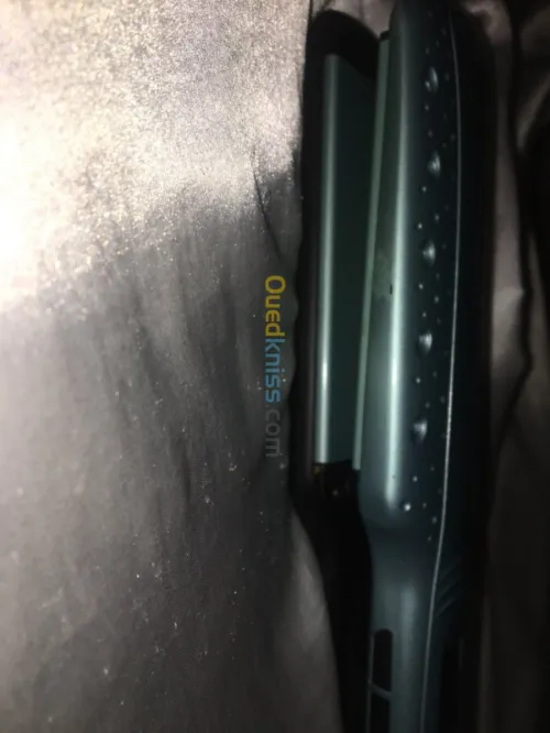 Fer à lisser Remington 