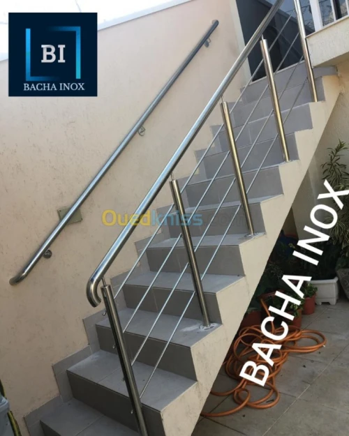 Rampe d'escalier en verre et en inox