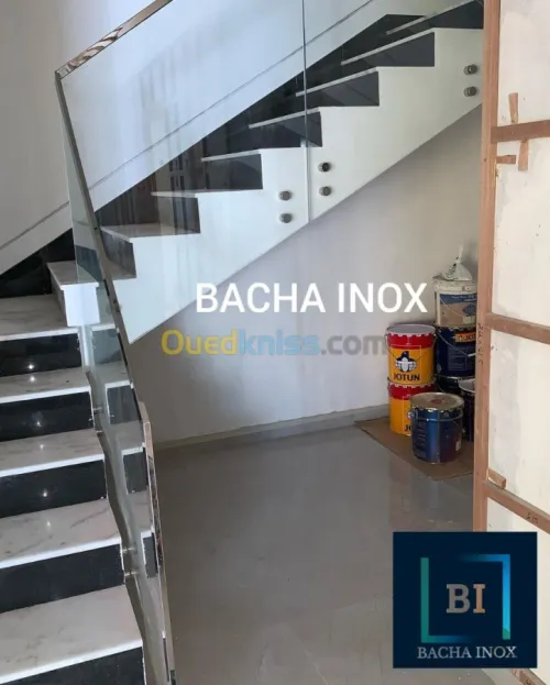 Rampe d'escalier en verre et en inox