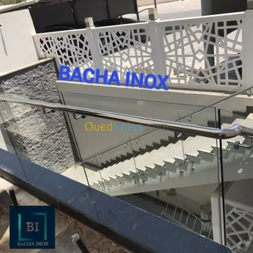 Rampe d'escalier en verre et en inox