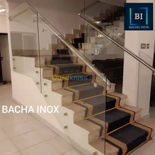 Rampe d'escalier en verre et en inox