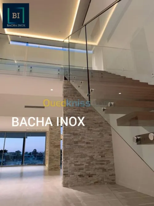 Rampe d'escalier en verre et en inox