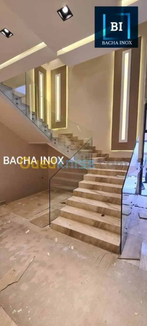 Rampe d'escalier en verre et en inox 