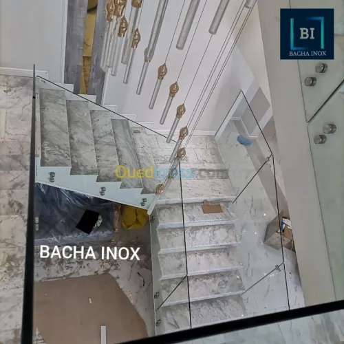 Rampe d'escalier en verre et en inox 