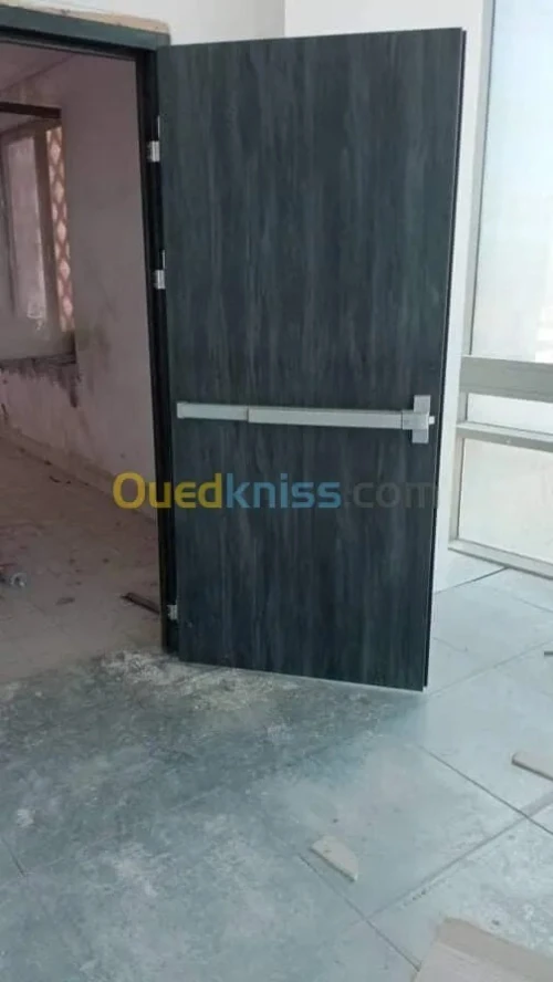 La pose des portes coupe feu et porte d entrée 