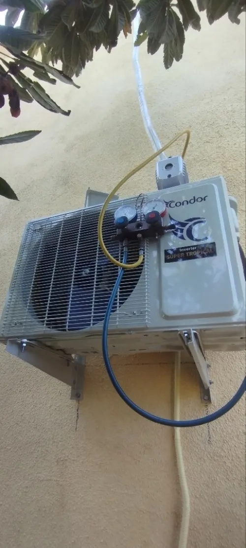 Installation climatiseur /chargement gaz avec tirage au vide