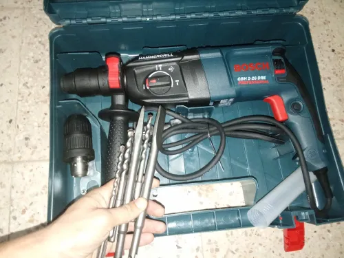   Perceuse BOSCH 13 MM +Perceuse HILTI BOSCH M+ Tronceneuse BOSCH 115 2CH+ Marteau Piquer BOSCH 38