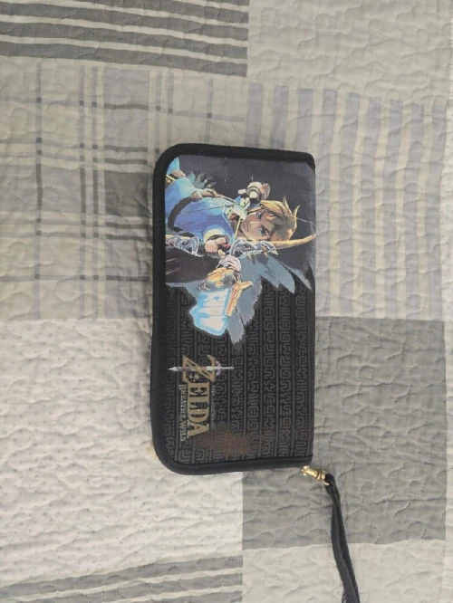 Nintendo switch + chargeur d'origine + porte manette + câble tv