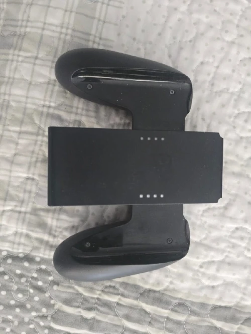 Nintendo switch + chargeur d'origine + porte manette + câble tv