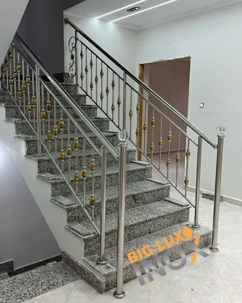 Travaux en inox et verre