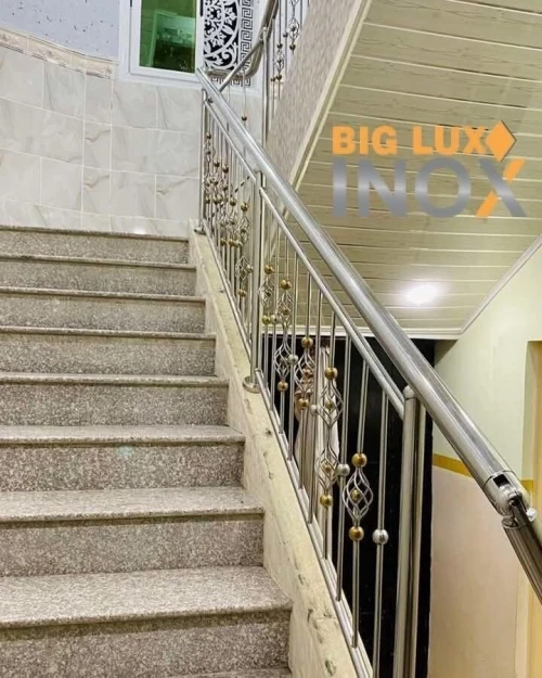 Travaux en inox et verre