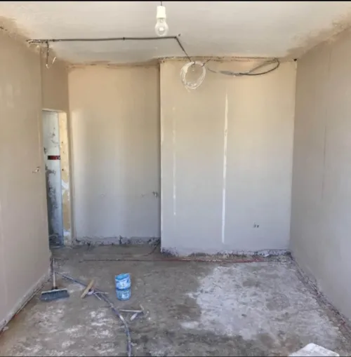 Platre projeté avec machine 