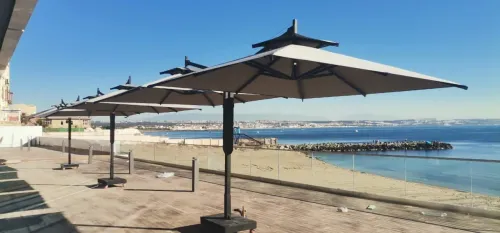 parasol t2 ( 6m sur 3 m) avec socle et fixtation sur le sol ( a votre choix )