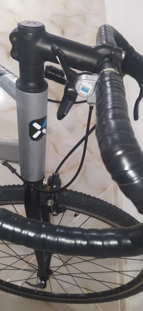 Velo de route triban 100