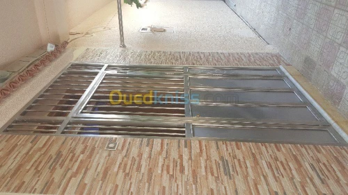 ESCALIER COLIMACON ET DROIT INOX ET BOIS