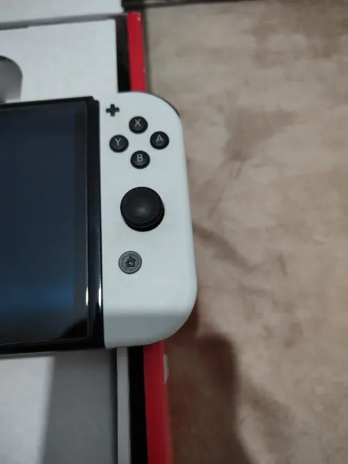 Nintendo switch oled flashée 128 go excellent état