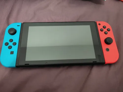 Nintendo switch V2 2021 flashée puce 128 go excellent état + mode online