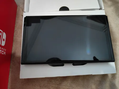 Nintendo switch oled flashée 128 go en excellent état