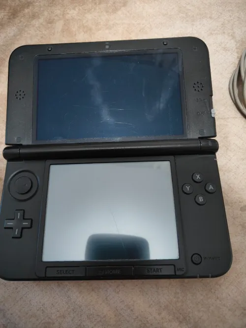 Nintendo 3ds XL + chargeur original