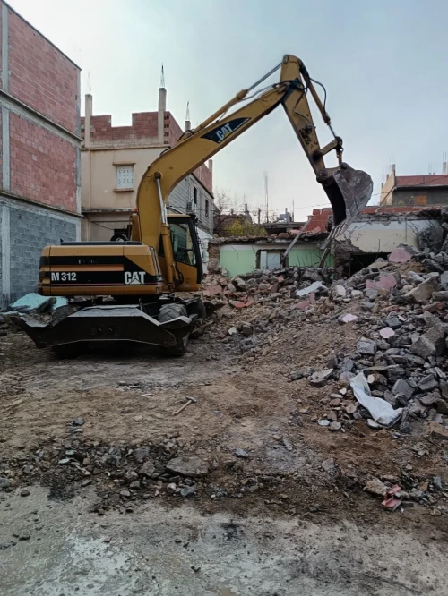 Location Pelle pneumatique Caterpillar M312 للكراء