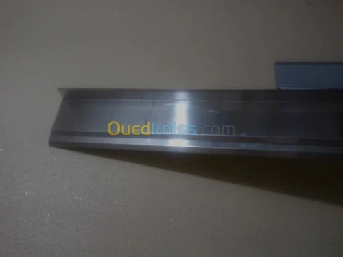 JOINT ET COUVRE JOINT DE DILATATION