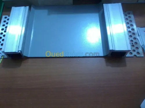 JOINT ET COUVRE JOINT DE DILATATION