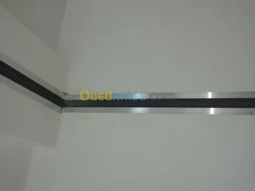 JOINT ET COUVRE JOINT DE DILATATION