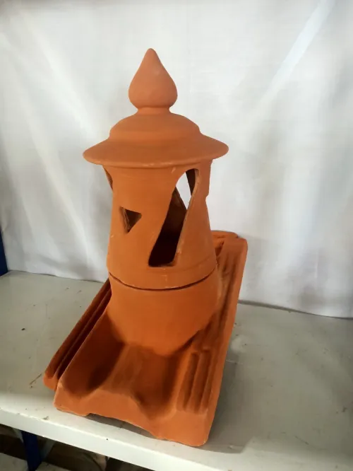 Cheminet pour charpente en tuile