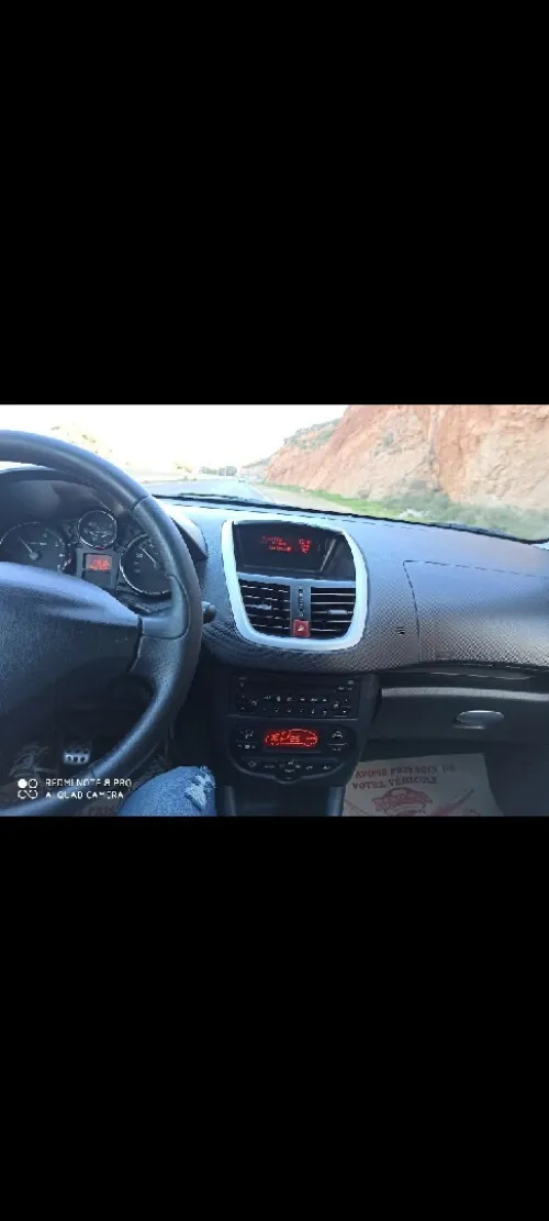 Peugeot 206 Plus 2012 generation