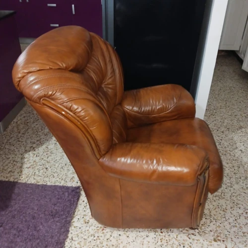 Fauteuil d'importation cuire véritable
