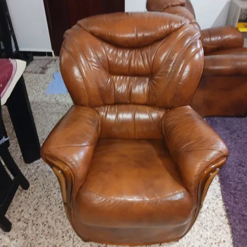Fauteuil d'importation cuire véritable