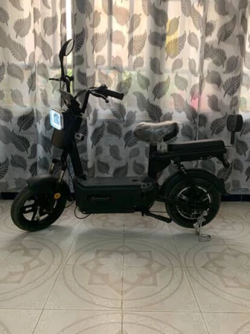 Scoozer دراجة كهربائية 2025
