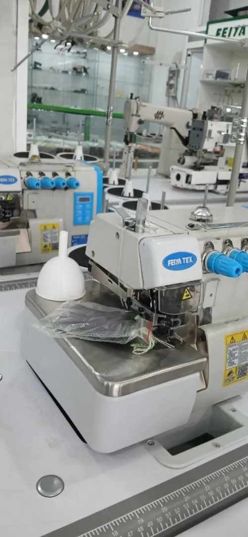 ماكينة الخياطة سورجي 5 خيوط machine à surjeteuse5 fill silencieuse feiya tex 